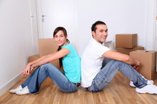 Professional removal team handling furniture in central London