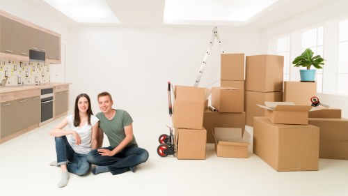 Packed boxes and furniture prepared for a small move