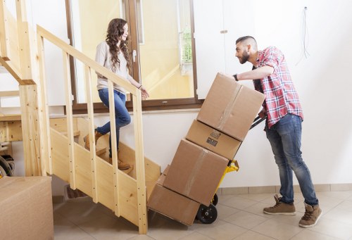 Professional movers handling IT equipment during office removals in Blackfriars